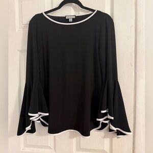 Elegant Black Top with White Trim